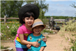 Siblings Posing with Hats