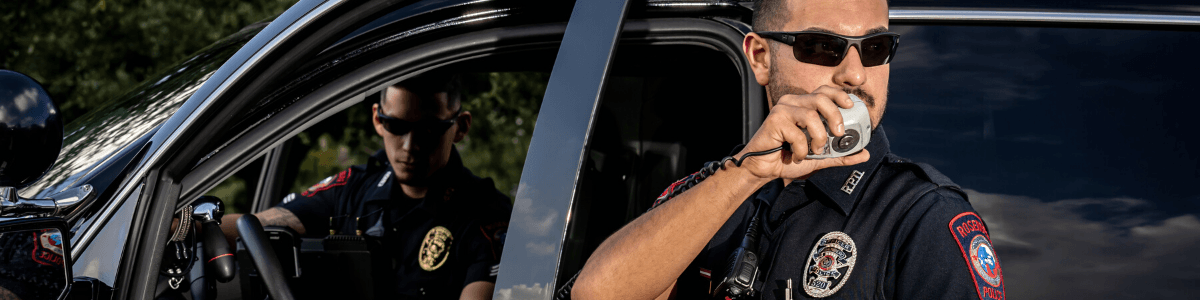 Police Officer Talking on Two-Way