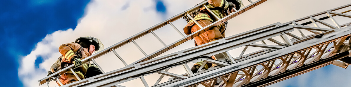 Firefighter on Ladder Truck