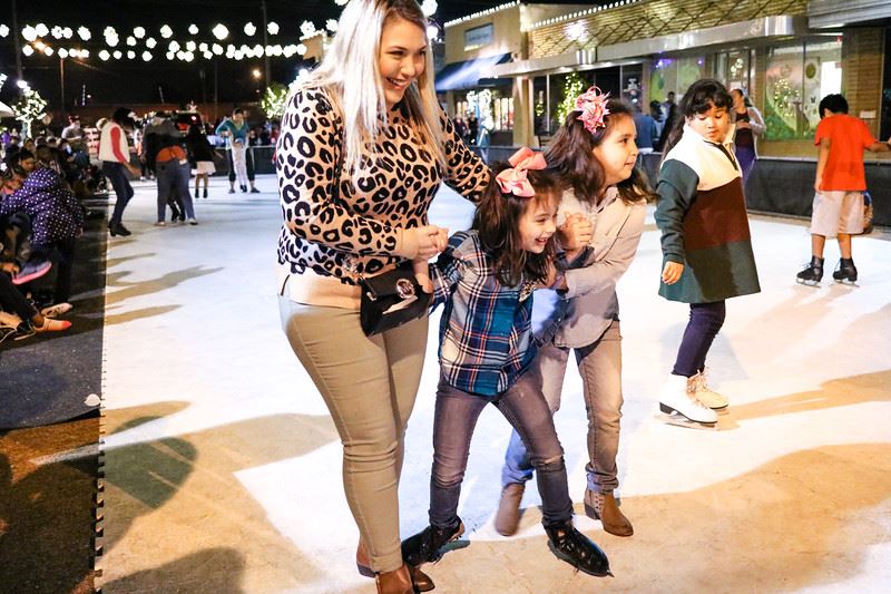 Woman and Girls Ice Skating